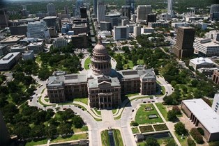 aerial view behind the Capitol, view of South Congress Street extending into the distance.